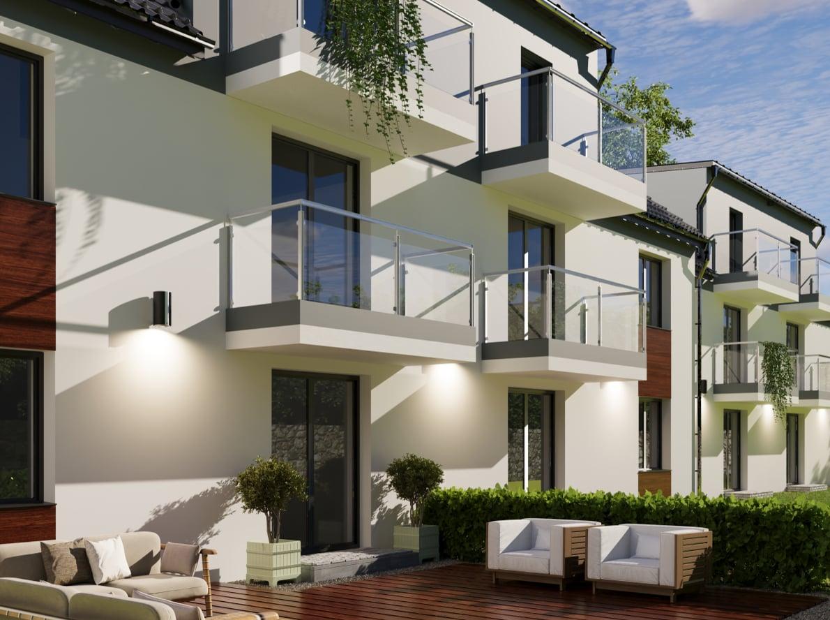 Balkony ze szklanymi balustradami